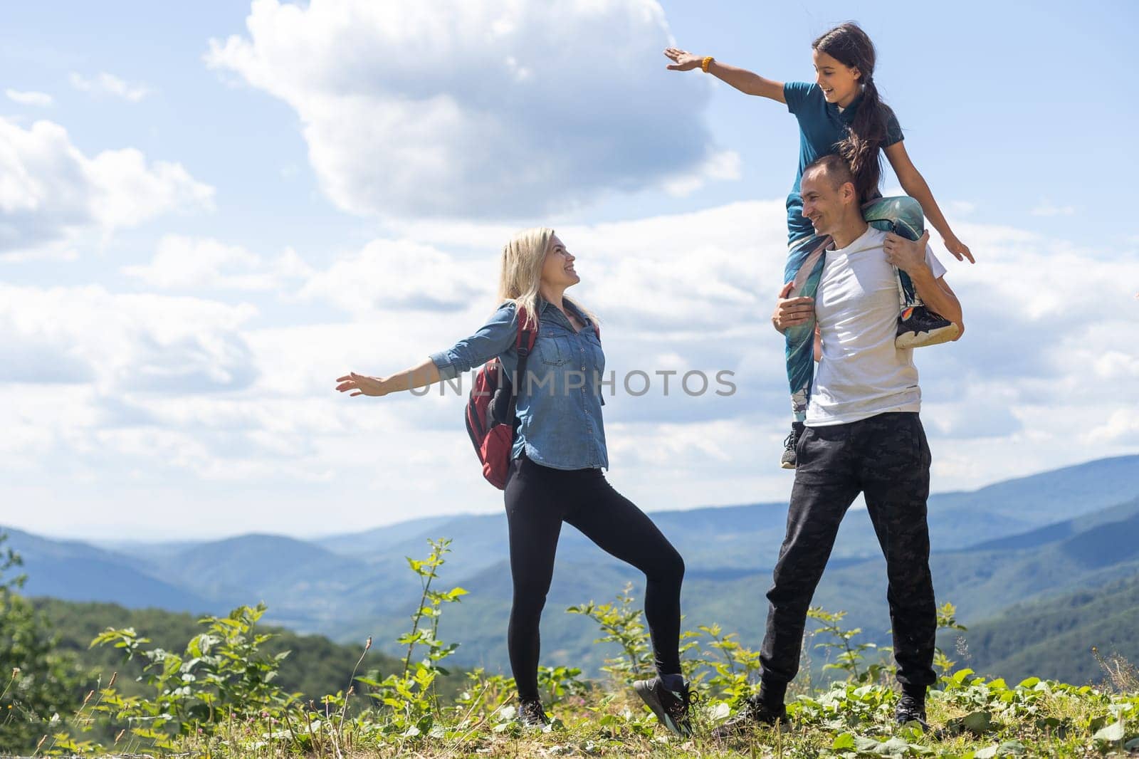 family in the mountains, family trip in mountains. by Andelov13