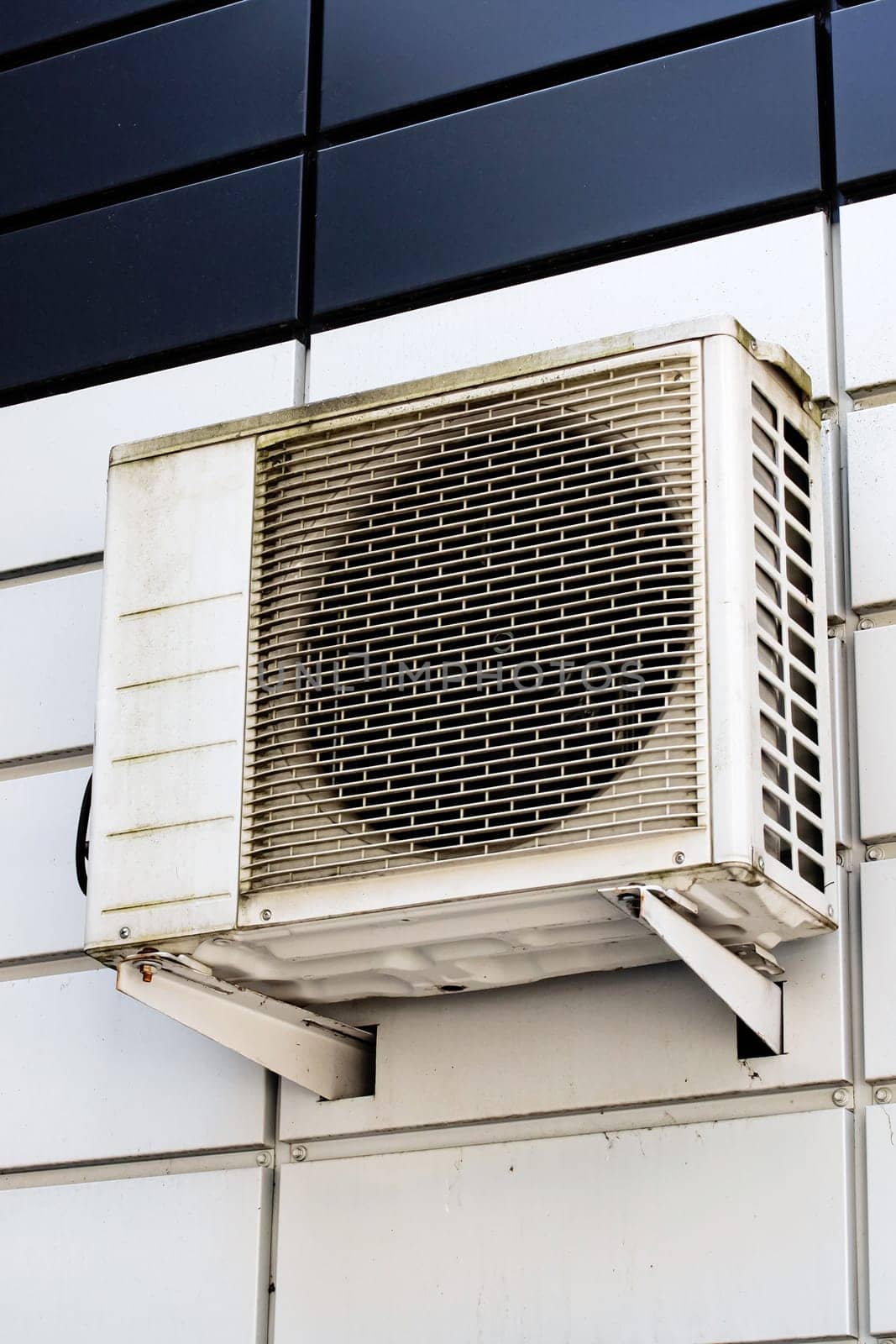 Air conditioning on the wall of the building close up