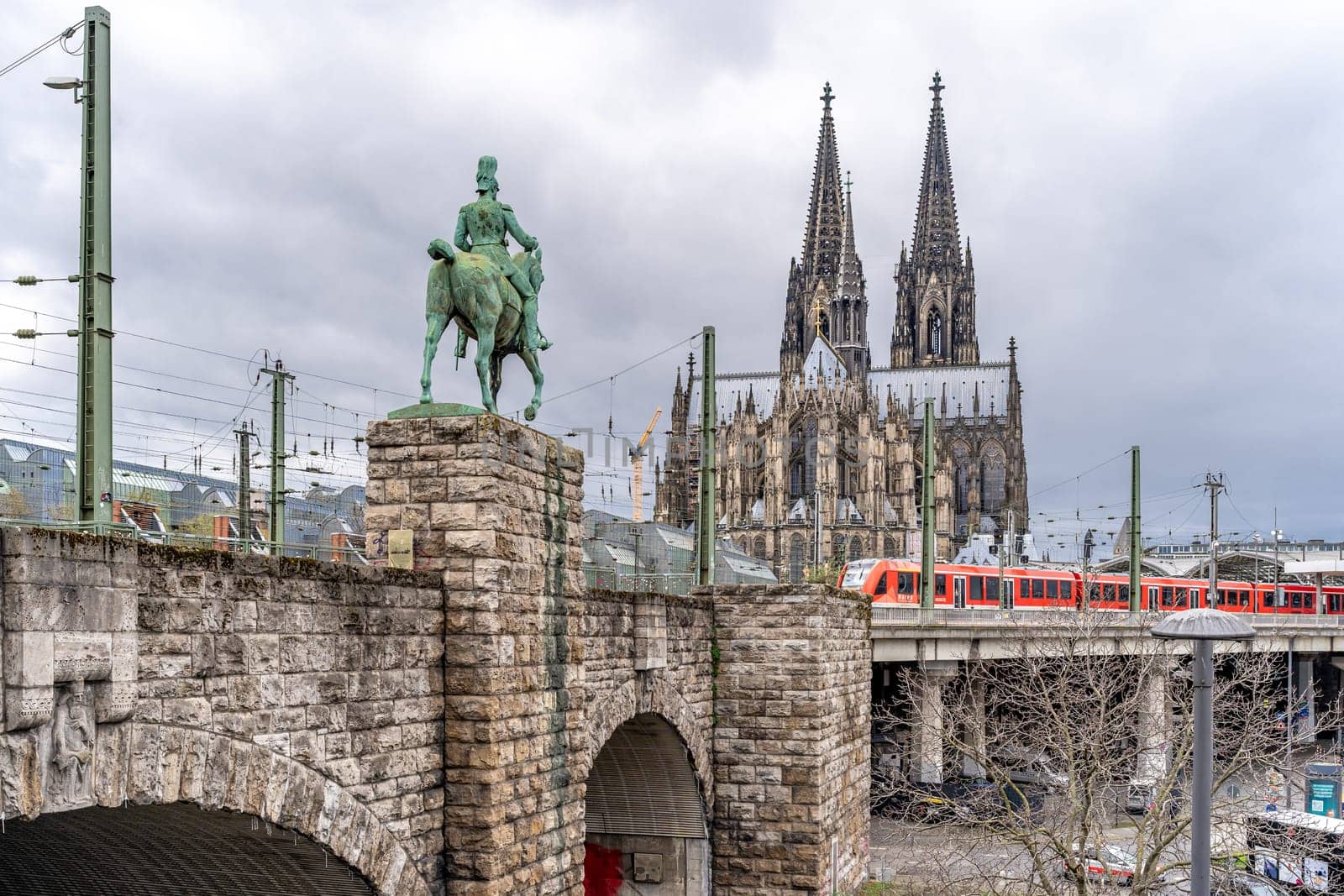 Cologne, Germany - March 23, 2023: Cathedral of St. Peter and Mary, Equestrian statue of Emperor William, main station.