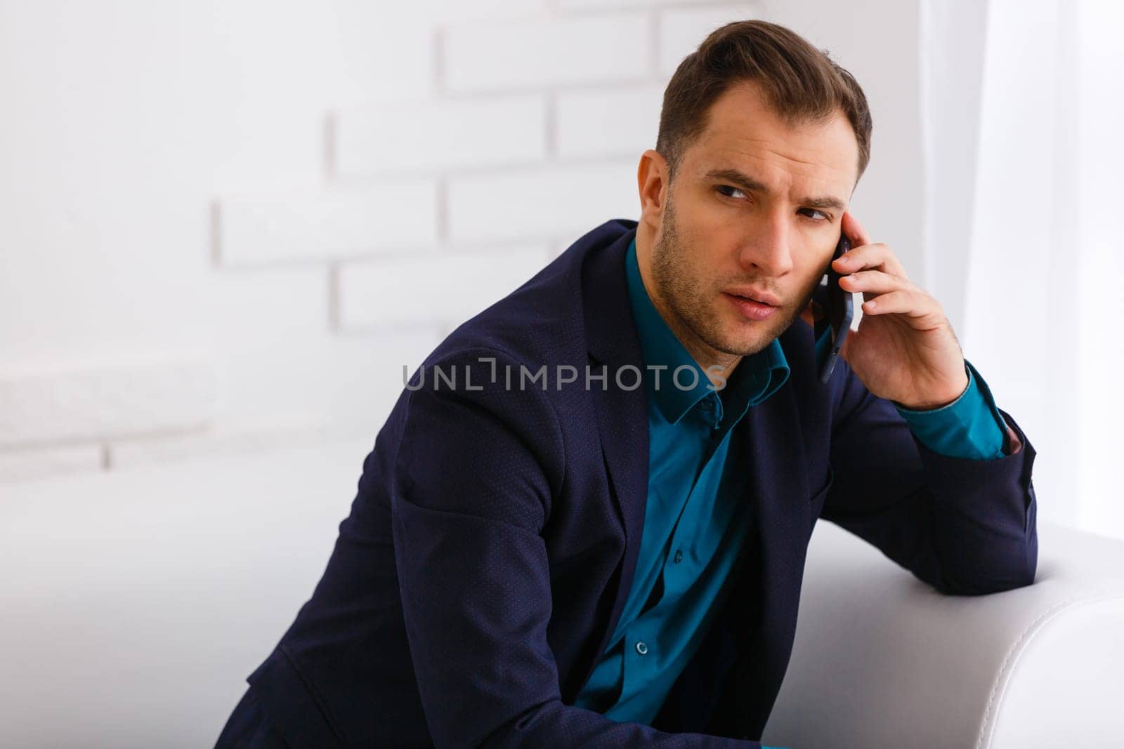 Happy businessman isolated - handsome man.