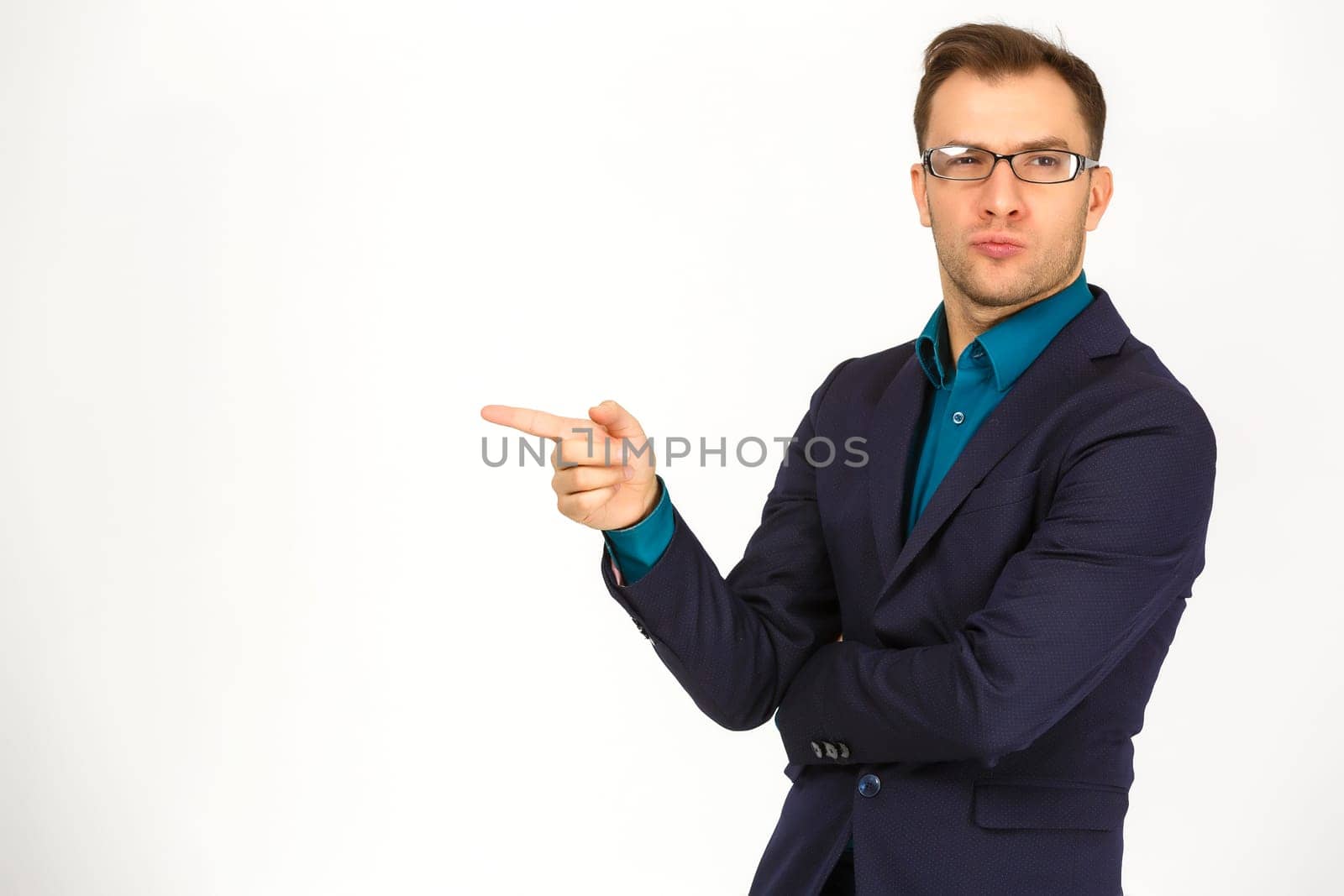 Man standing and presenting something above against white background