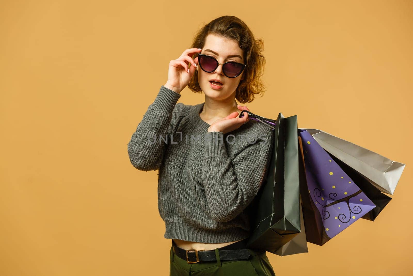 Woman in shopping. Happy woman with shopping bags enjoying in shopping. Consumerism, shopping, lifestyle concept.