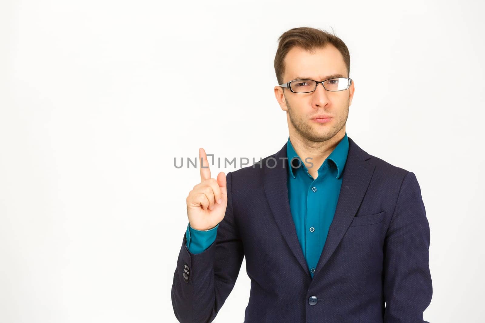 Man standing and presenting something above against white background