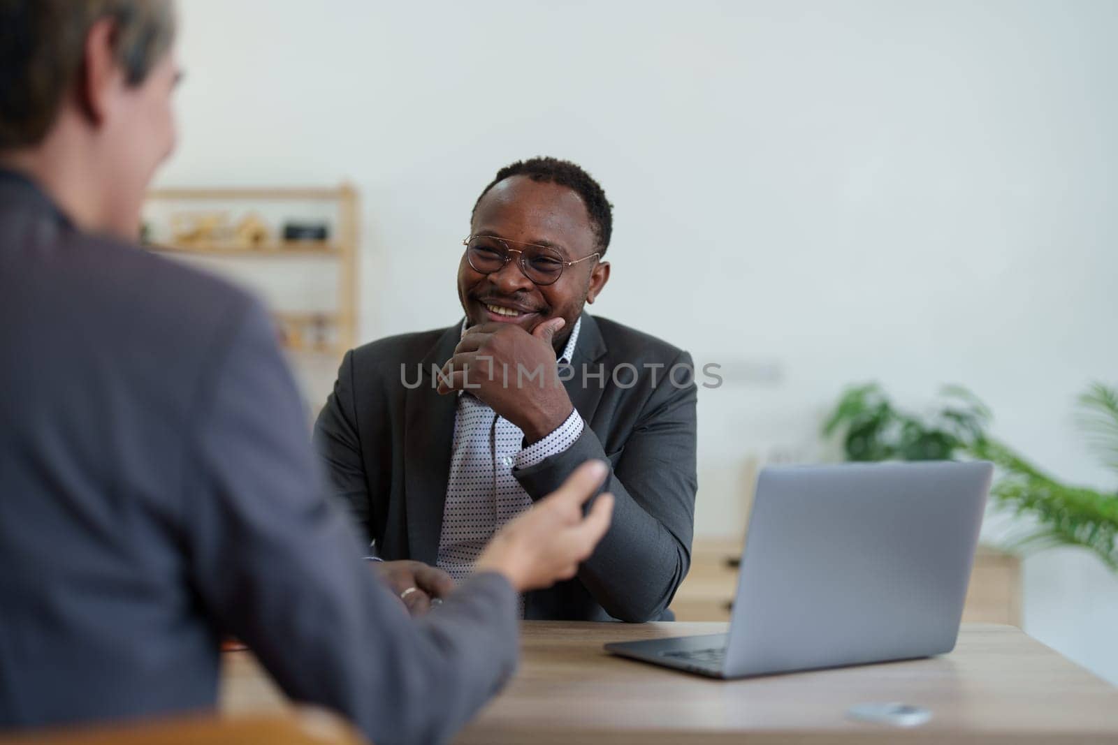 african american attorney, lawyers discussing contract or business agreement at law firm office, Business people making deal document legal, justice advice service concepts.