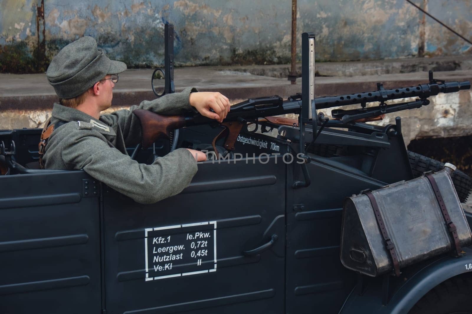 Hel, Poland - August 2022 Military troops marching during 3 May Polish Constitution Day ceremonial patriotic parade. Polish armed forces tanker military parade. Old guns and cars. Feast of Polish Armed Forces Day, American soldiers with US flag on parade Nato Vehicles Military Equipment