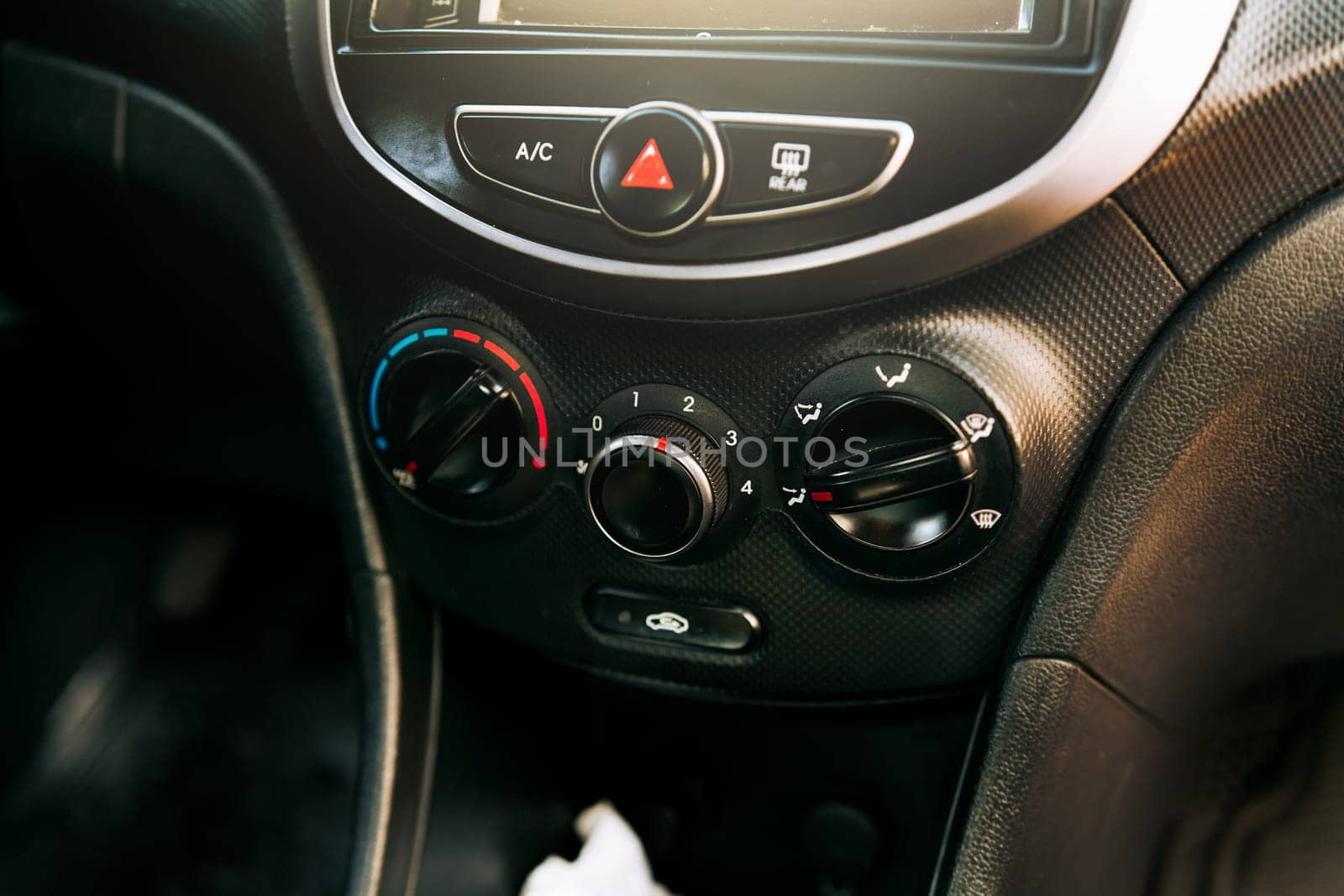 Front view of a car air conditioning control panel. Close up of automotive air conditioning switch panel, Air conditioning knob of a car