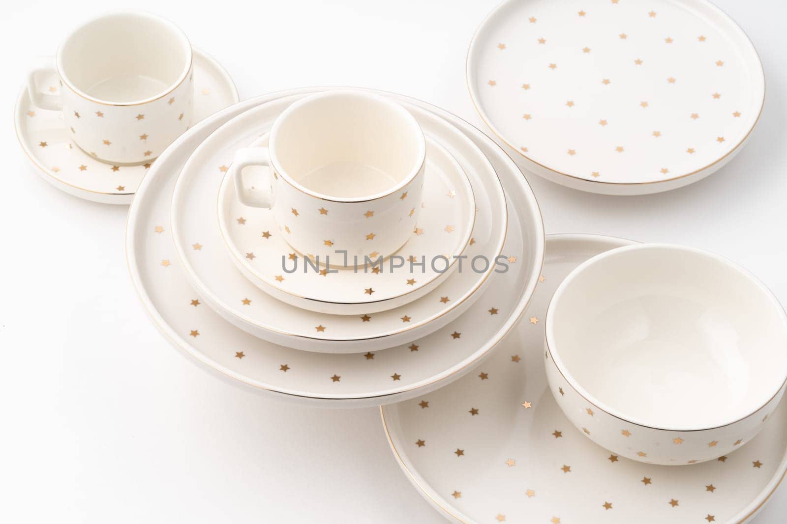 A set of ceramic tableware isolated on white background