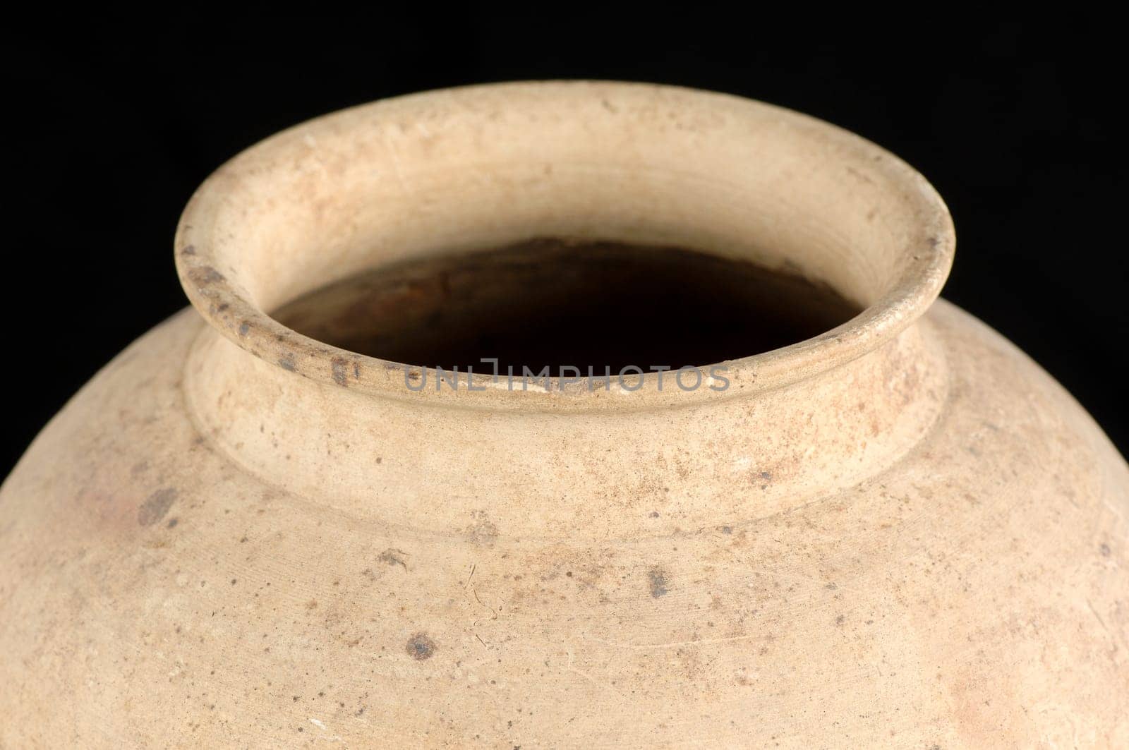 A clay vase isolated on a white background