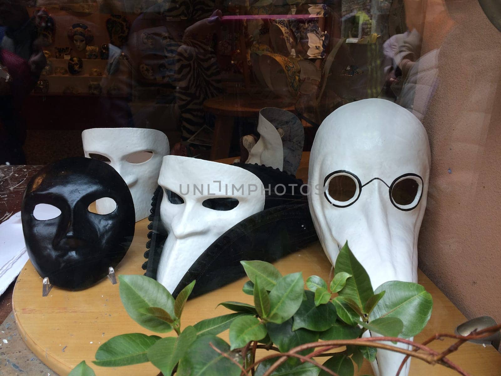 Venetian carnival masks in a shop window. High quality photo