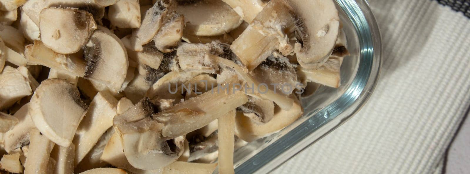 Frozen food sliced mushrooms champignon homemade. Harvesting concept. Stocking up vegetables for winter storage Healthy food, Cooking ingredients