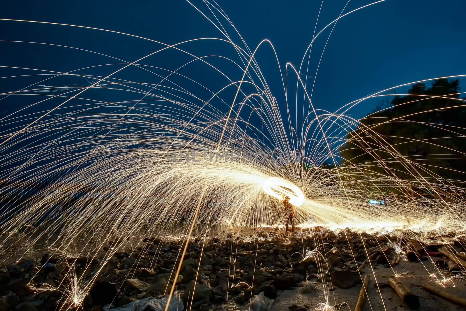Playing with flames Holding a fire to cause flakes