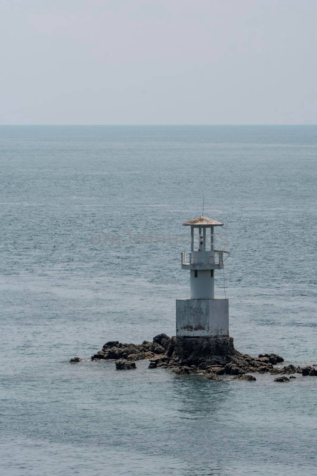 Seaside lighthouse And seems to be in the sea when the water rises