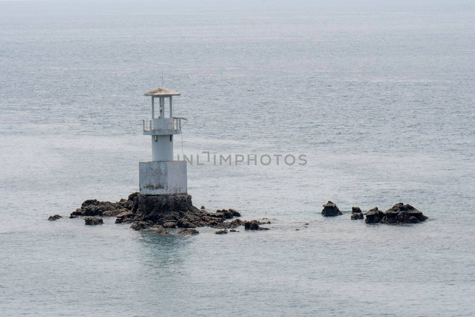 Seaside lighthouse And seems to be in the sea when the water rises