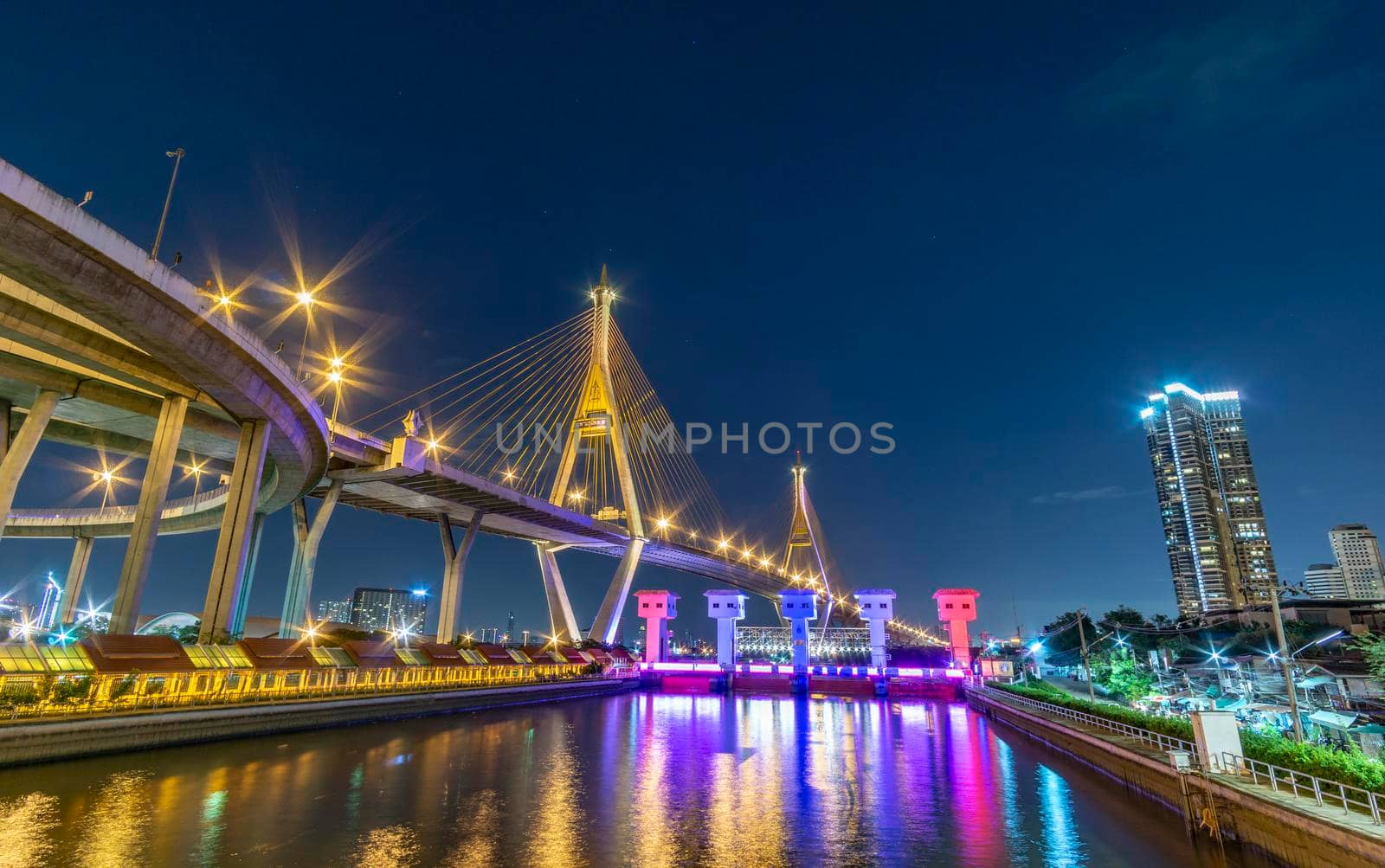Bhumibol Bridge, Chao Phraya River Bridge. Turn on the lights in many colors at night.