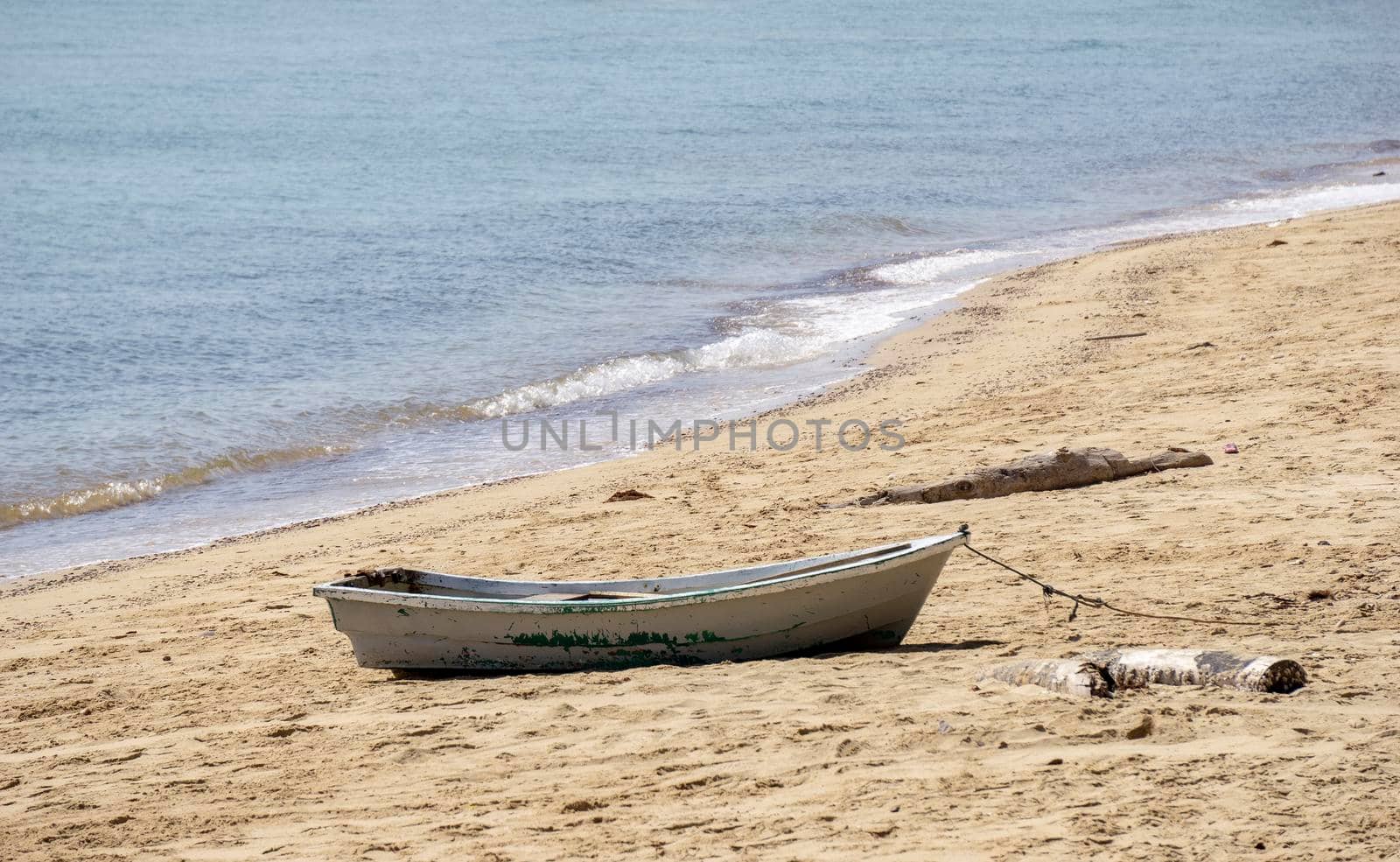 Small boat on the beach. Small boats on the beach Because the sea water decreases Sandy beach at Sairee Beach, Chumphon Province
