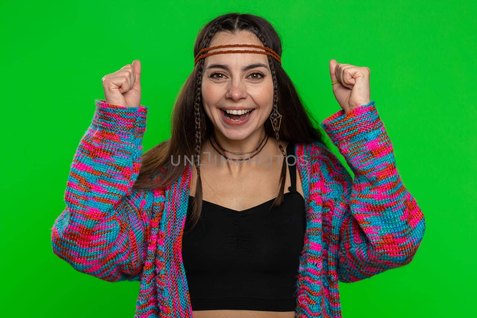 Happy joyful hippie woman shouting, celebrating success, winning, birthday, lottery jackpot goal achievemen, good news, victory, lucky fortune. Young happy girl on chroma key background, green screen