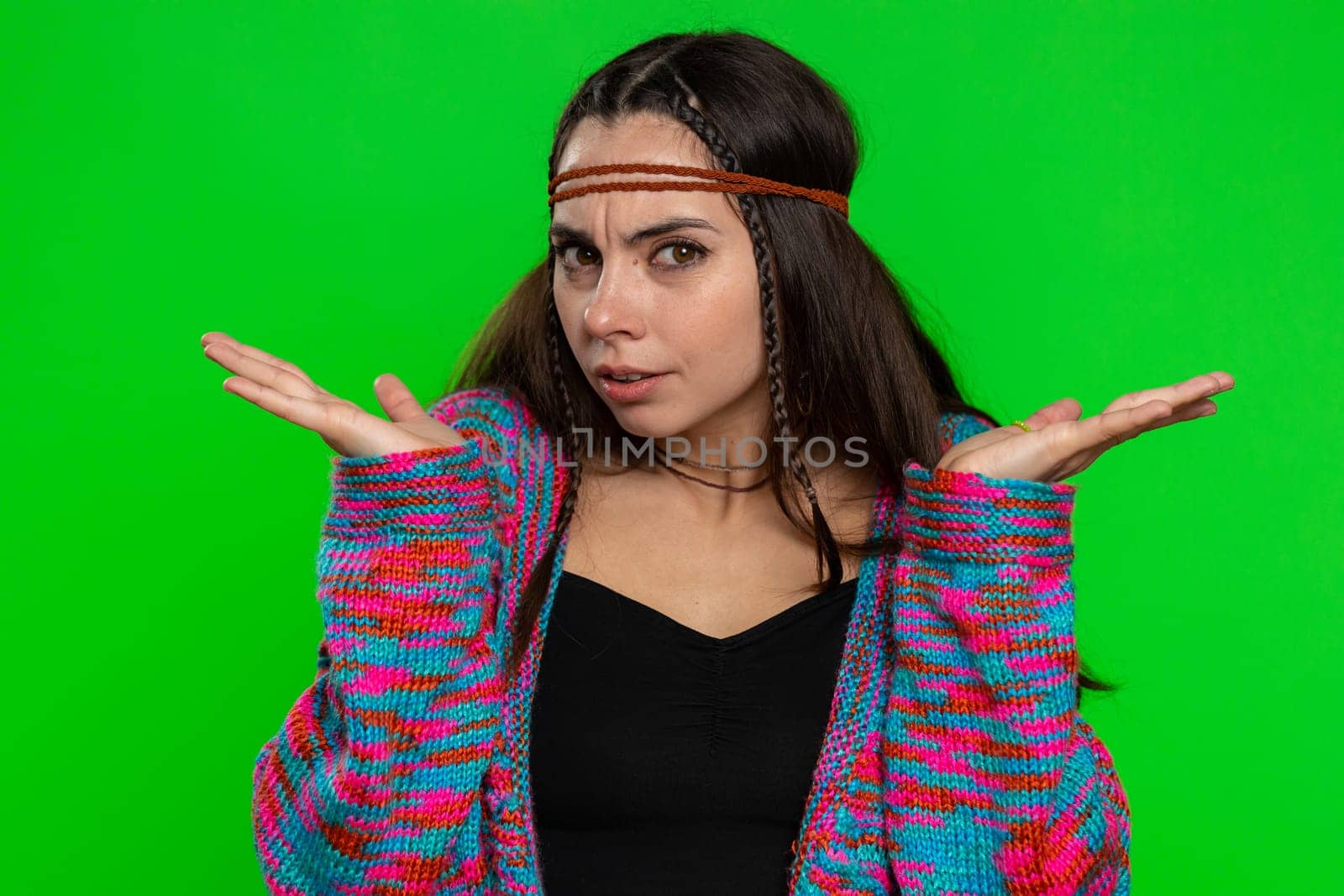 What Why. Sincere irritated woman raising hands in indignant expression ask reason of failure demonstrating disbelief irritation by trouble. Confused hippie girl on chroma key background, green screen