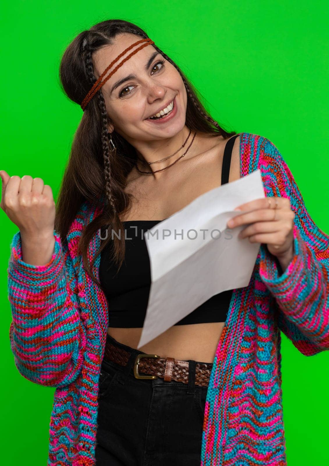 Pretty young hippie woman open envelope take out letter reads it feel happy. Girl career growth advance promotion, bank loan approve, monetary award, long-awaited invitation great news, lottery win