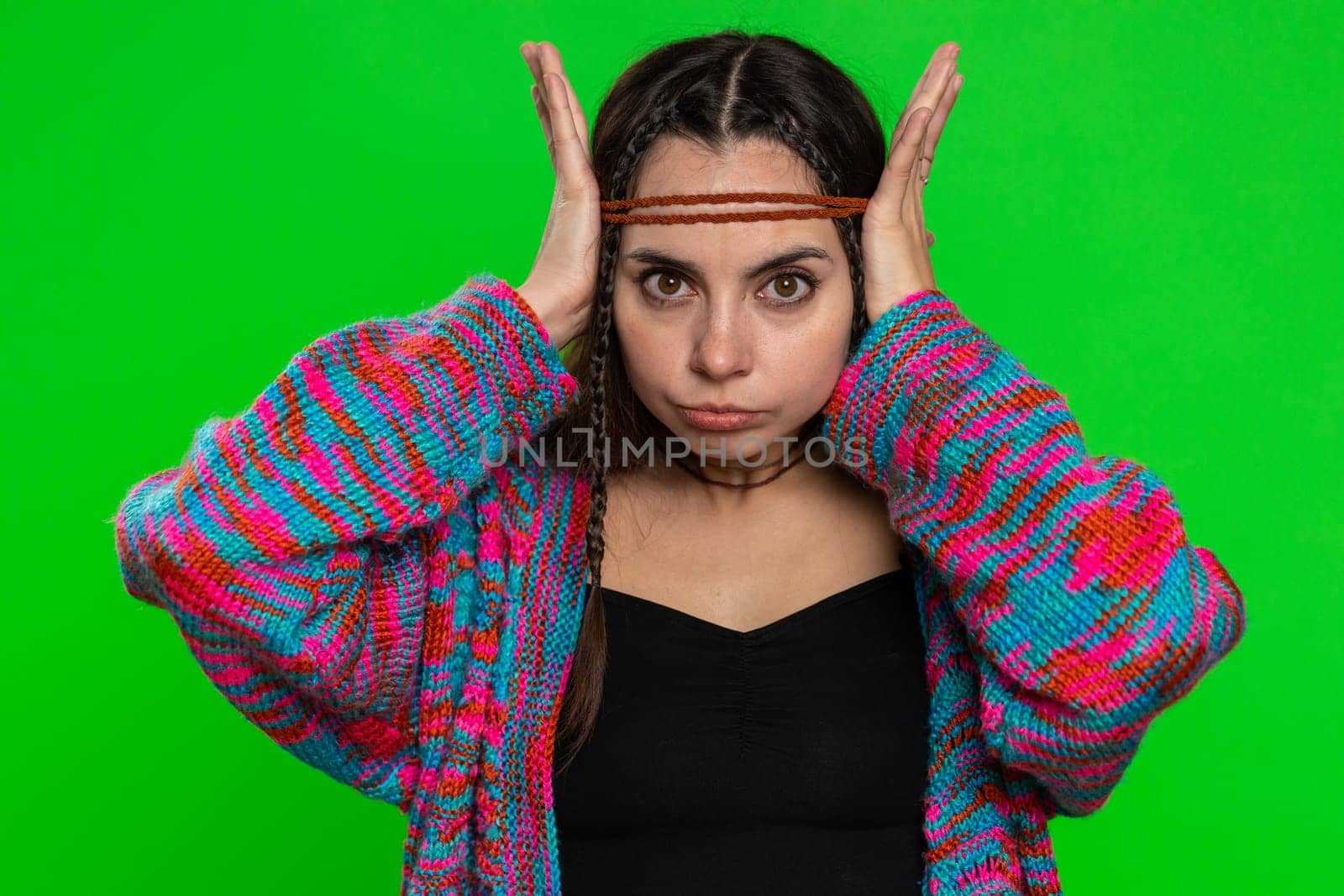 Dont want to hear and listen. Frustrated annoyed irritated woman covering ears gesturing No, avoiding advice ignoring unpleasant noise loud voices. Hippie girl isolated alone on chroma key background