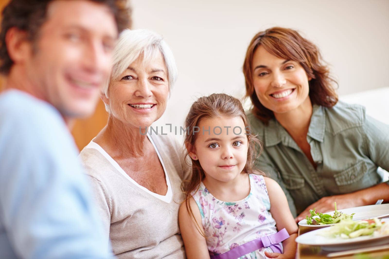 Making time for family is so important. a multi-generational family having a meal together