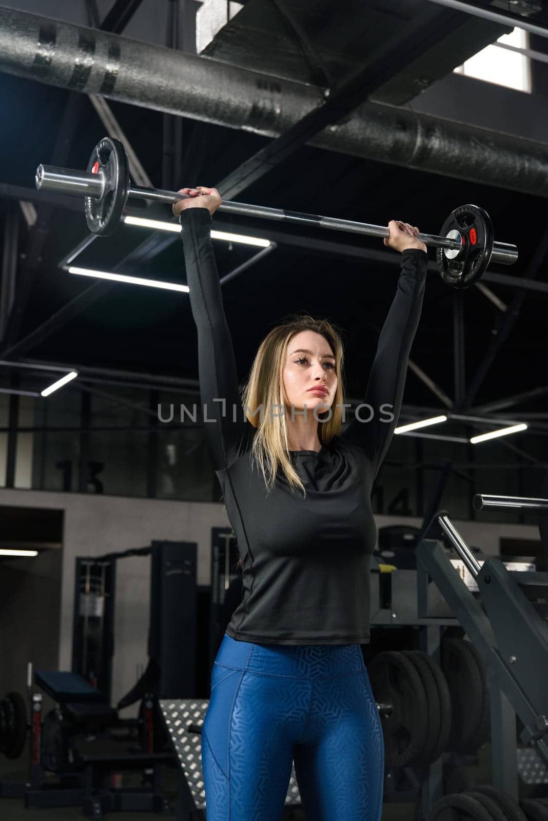 Barbell press, woman and exercise for fitness, workout and sports training in gym. power and energy.