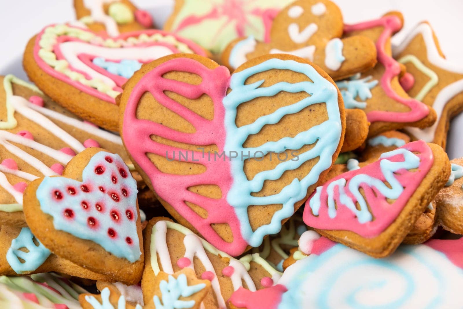 Heart shaped sugar cookies for St Valentines Day with colorful icing.