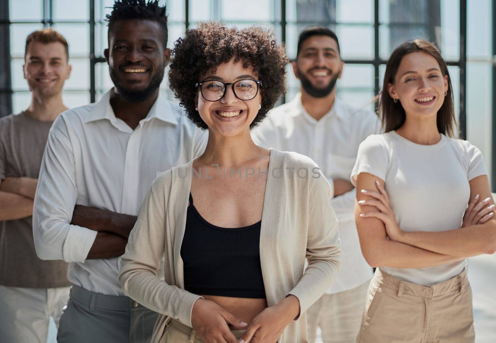 Face of beautiful woman on the background of business people