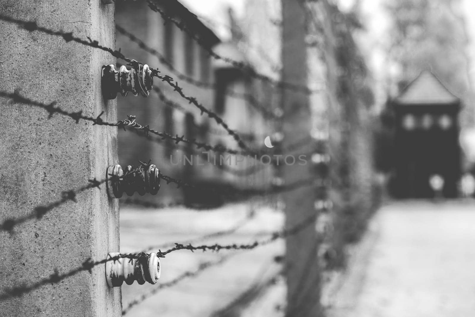 Poland, Auschwitz - April 18, 2014: Barbed wire fence in Auschwitz II-Birkenau Concentration Camp