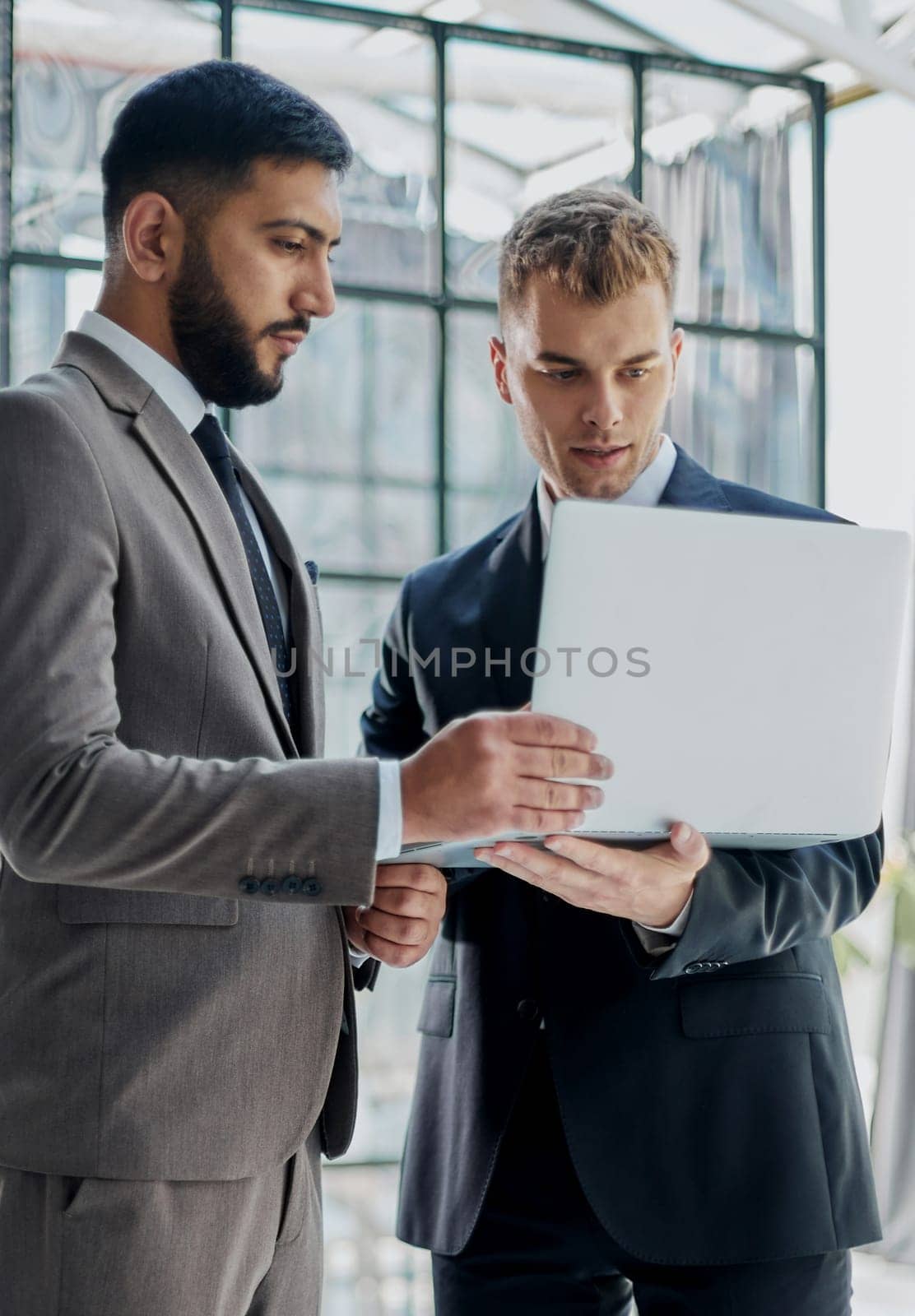 Businessman discussing project with colleague