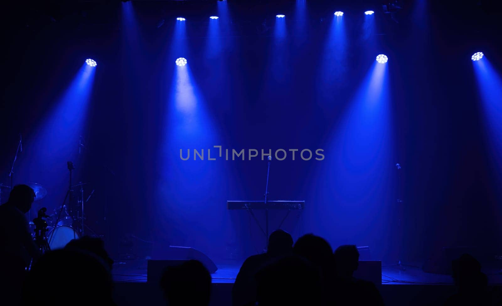 Light on a free music stage, scene with blue spotlights scene background