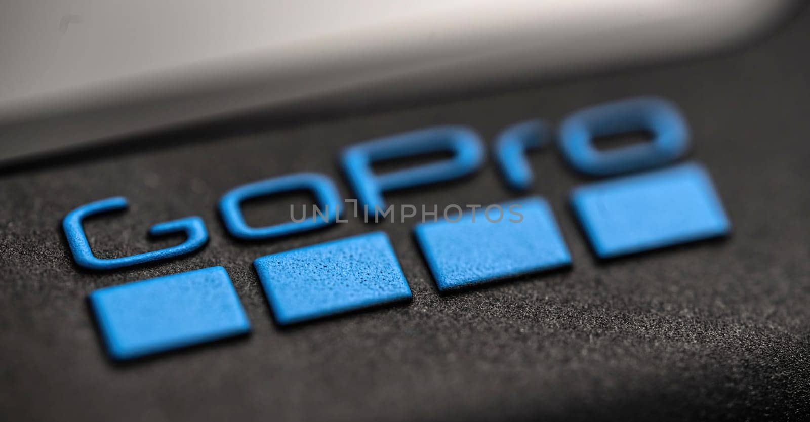 Poznan, Poland - 30 November 2022: Logo of Action camera GoPro, close up view