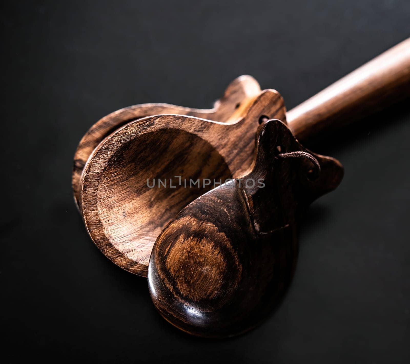 Wooden castanet for flamenco dance closeup. Traditional hispanic musical instrument for live perfomance and latin culture