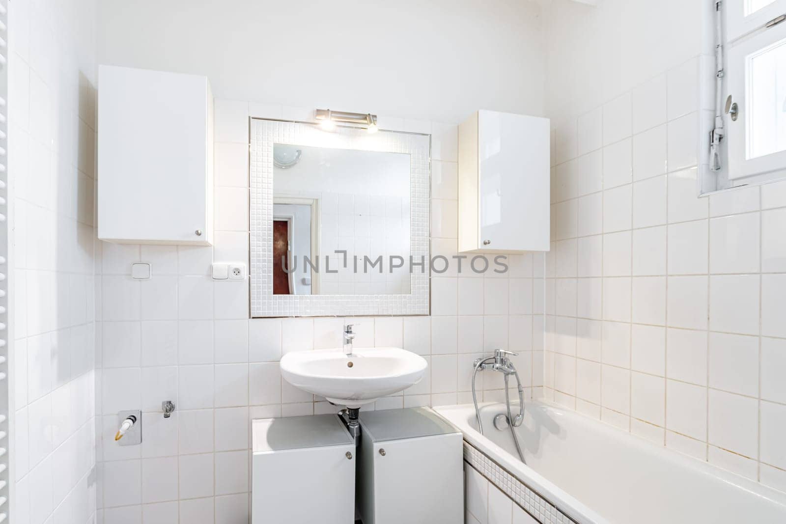 a bathroom in an apartment of a residential building. High quality photo