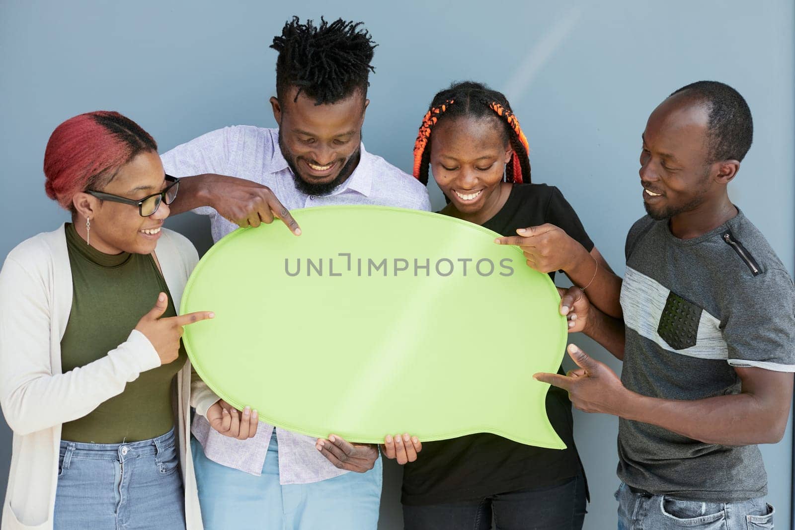 Young african american friends holding up copyspace placard thought bubbles by Prosto