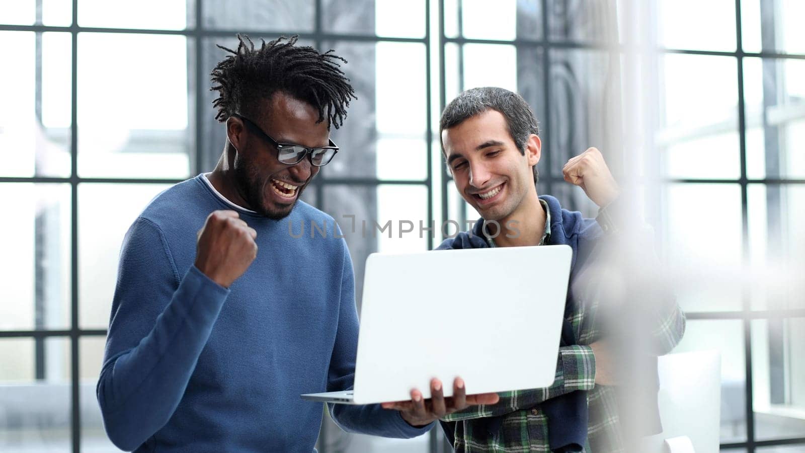 Business men discussing plans in modern office