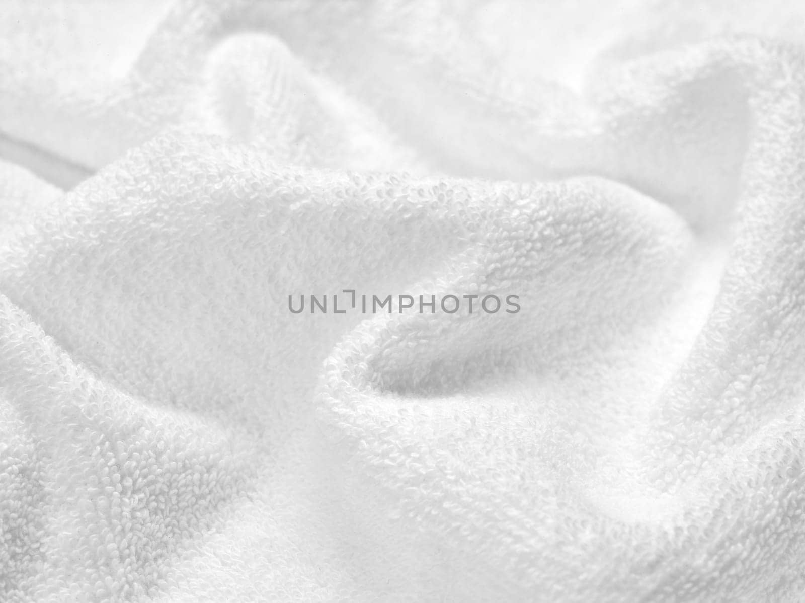 close up of a white towel bathroom on white background