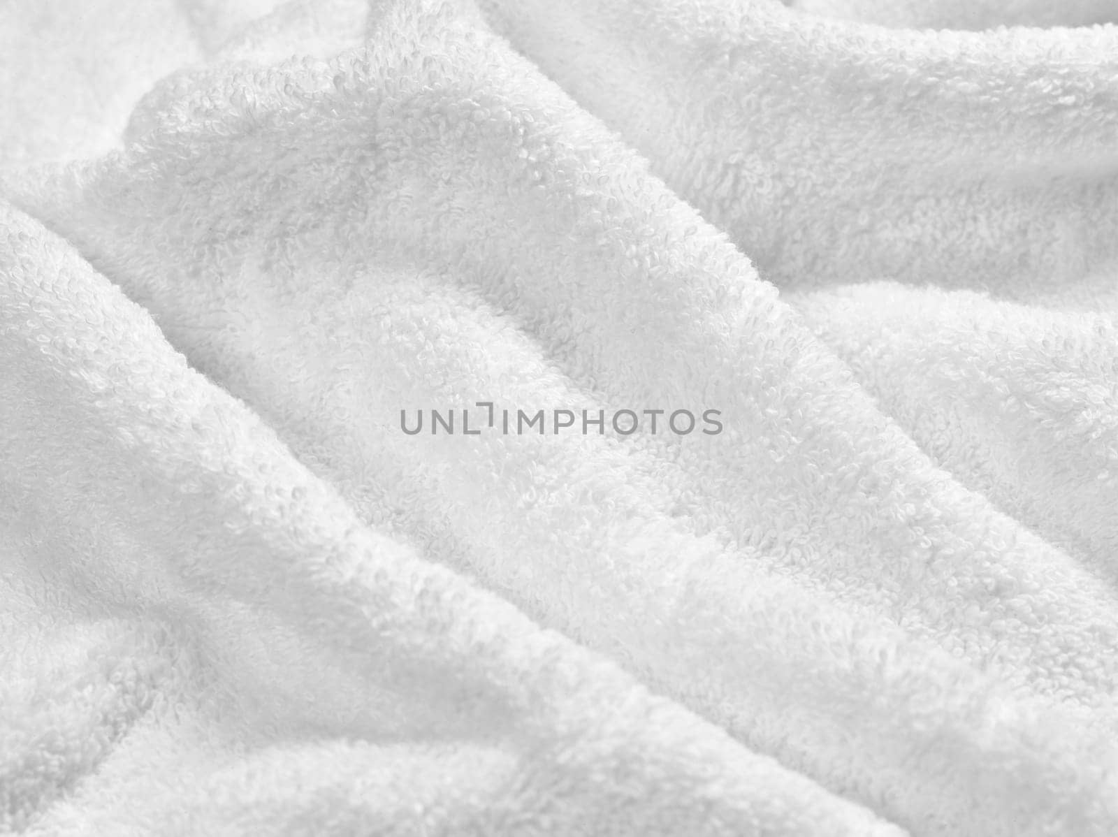 close up of a white towel bathroom on white background