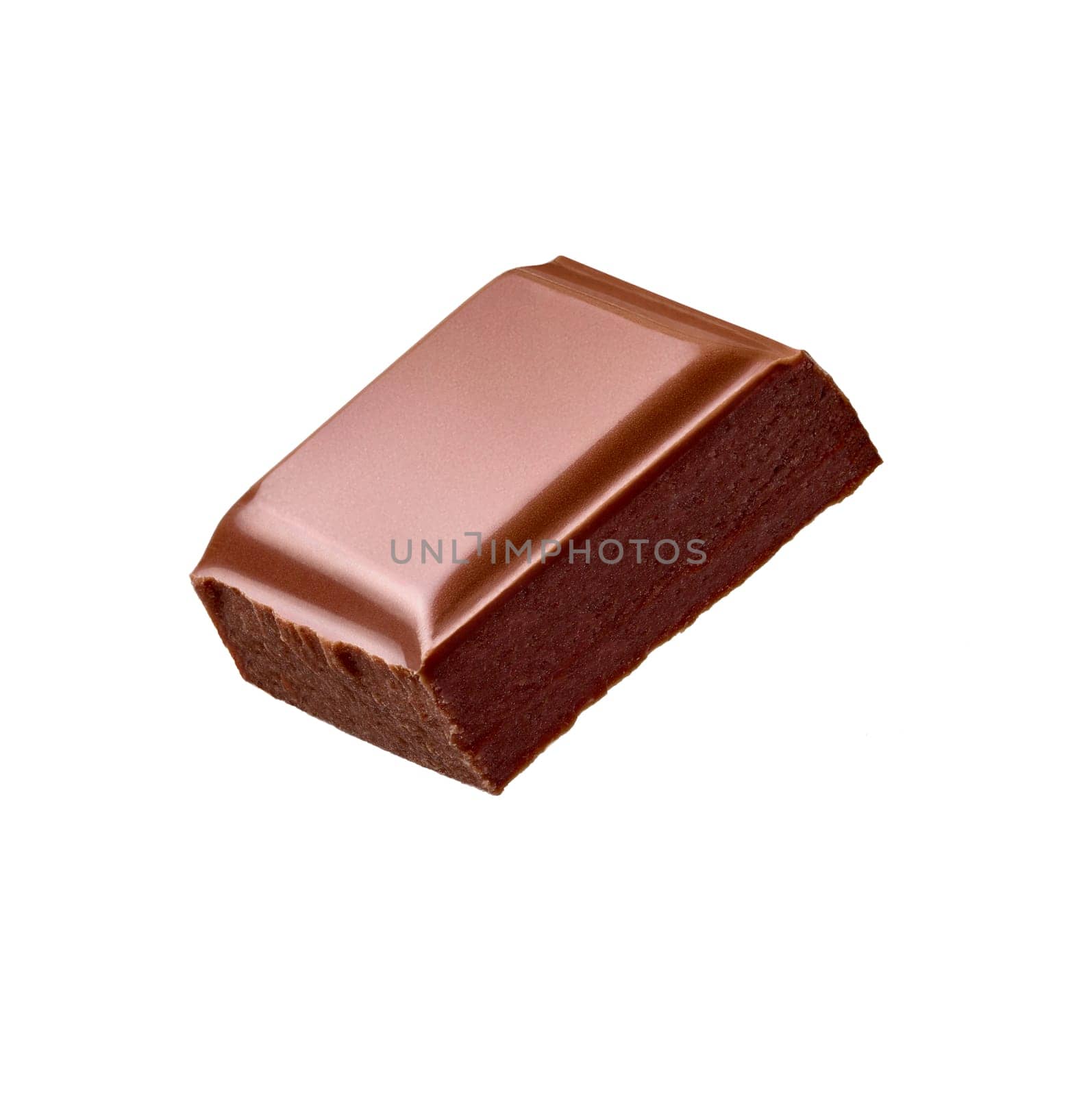 close up of chocolate pieces stack falling on white background