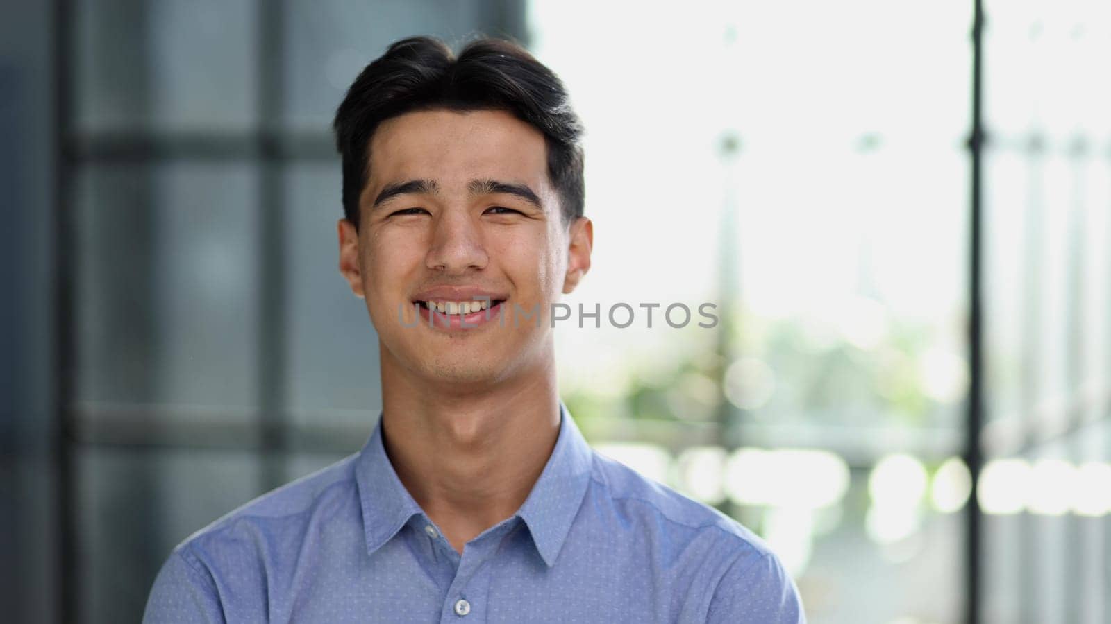 Portrait of a successful Asian businessman, in a modern office building