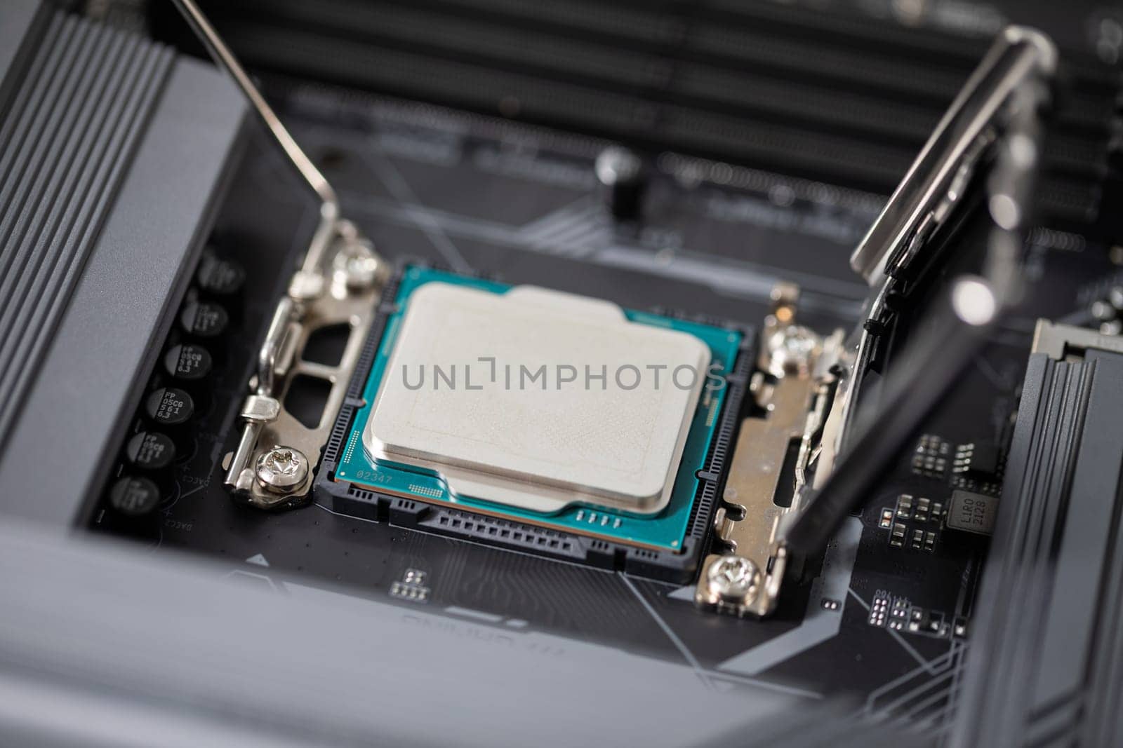Gently and carefully connecting a new computer part. Purchasing and replacing computer parts to increase the performance of the device. Connecting the new processor to the computer