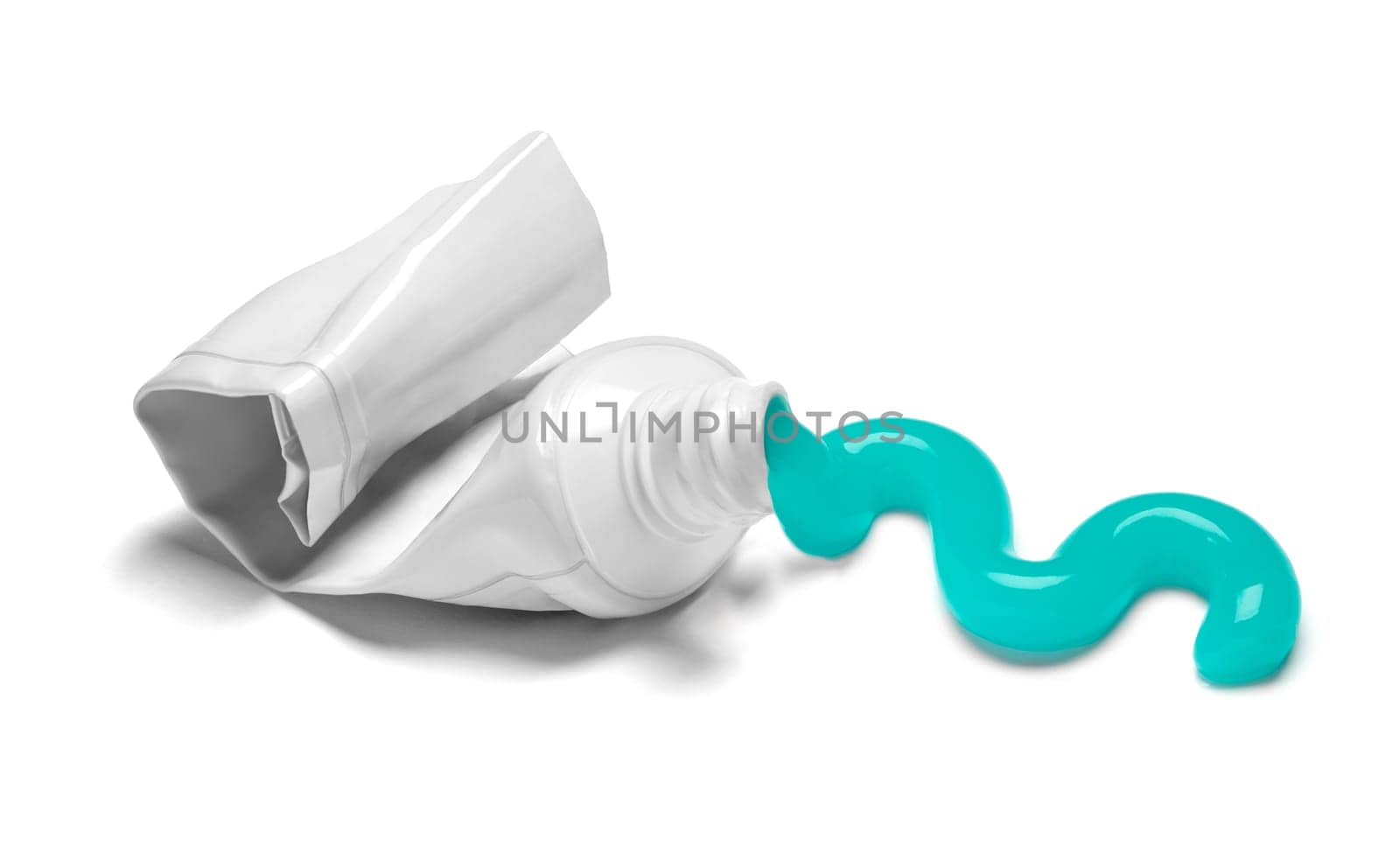close up of a used empty toothpaste tube on white background