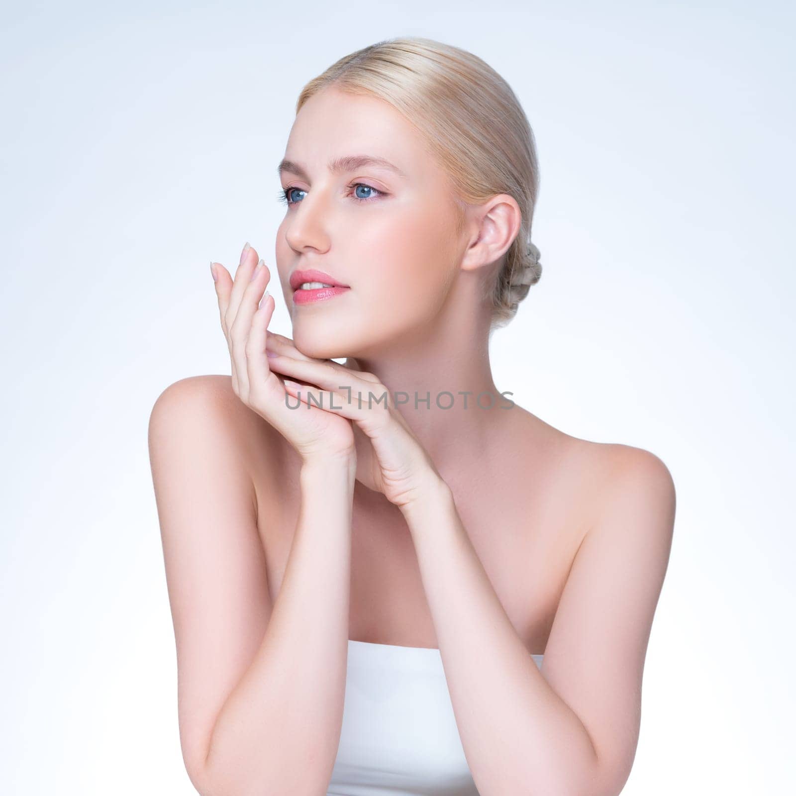 Personable beautiful woman portrait with perfect smooth clean skin and natural makeup portrait in isolated background. Hand gesture with expressive facial expression for beauty model concept.