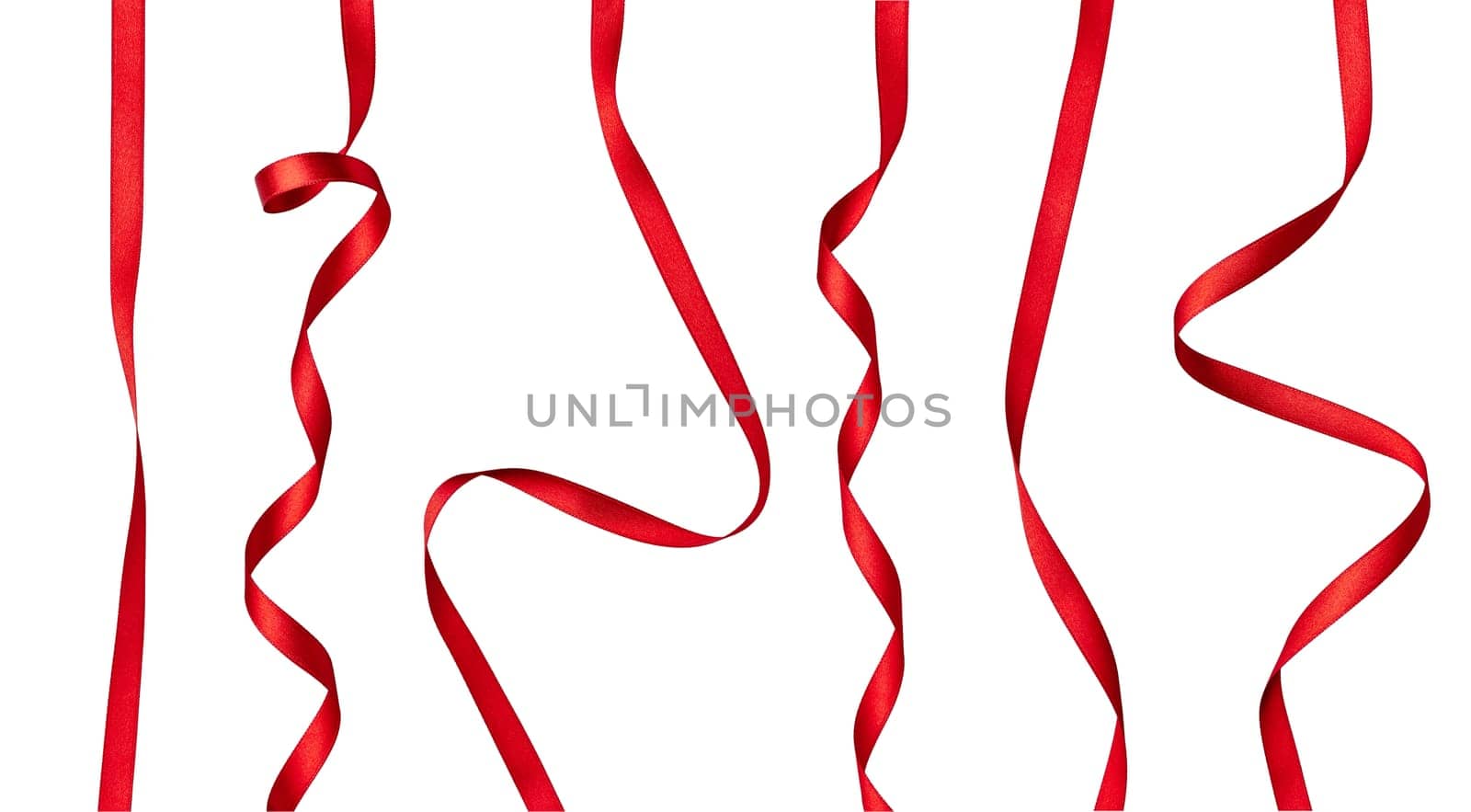 collection of various red ribbon pieces on white background. each one is shot separately