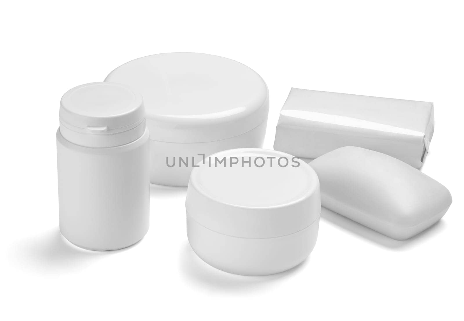 close up of a white beauty cream container and tube on white background