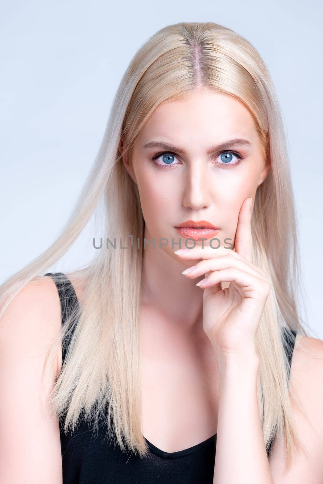 Closeup personable beautiful woman portrait with perfect smooth clean skin and natural makeup portrait in isolated background. Hand gesture with expressive facial expression for beauty model concept.