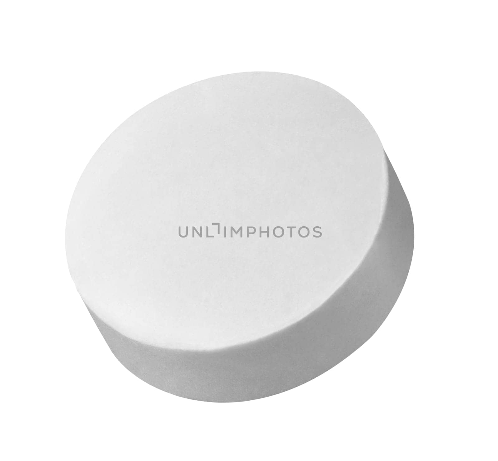 close up of a white pill on white background