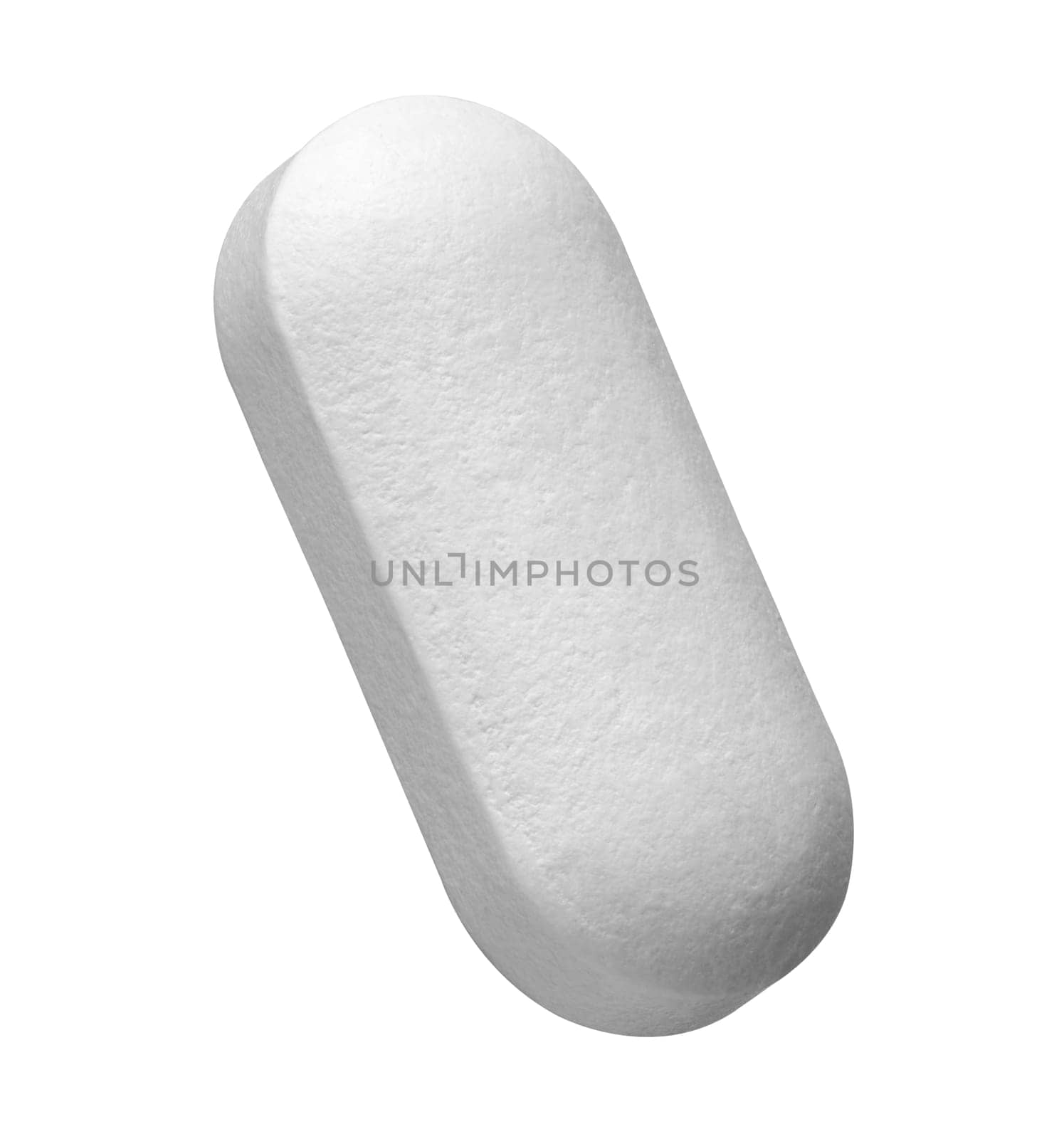 close up of a white pill on white background