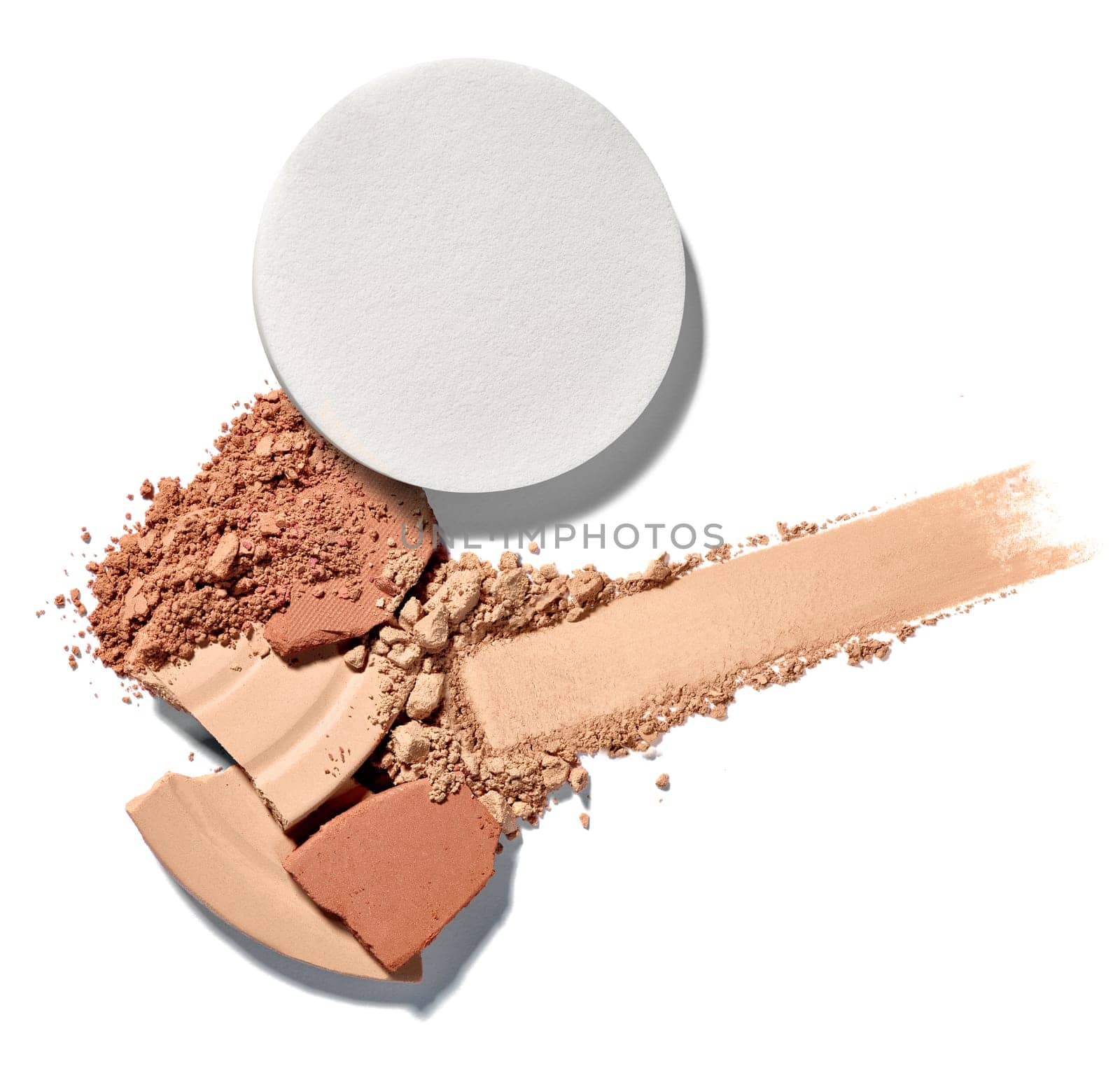 close up of face powder on white background