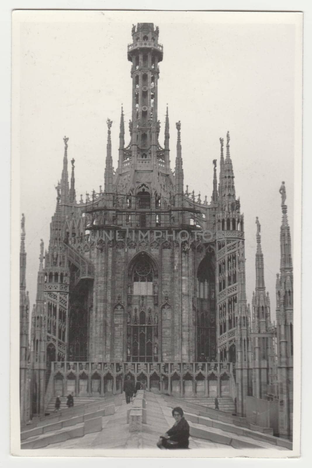 MILANO, ITALY - CIRCA 1970s: Vintage photo shows cathedral Il Duomo. Retro black and white photography. Circa 1970s.