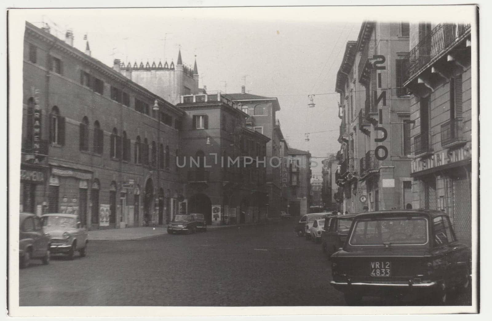 ITALY - CIRCA 1970s: Vintage photo shows the Italian street. Retro black and white photography. Circa 1970s.